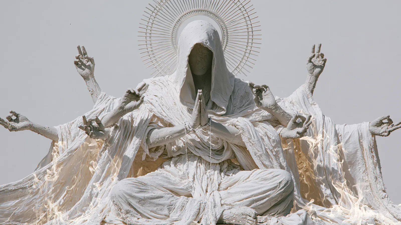 Saint of Light, a white veiled figure with a radiant halo and many hands